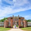 Front of Tryon Palace with Two People Standing at Entrance